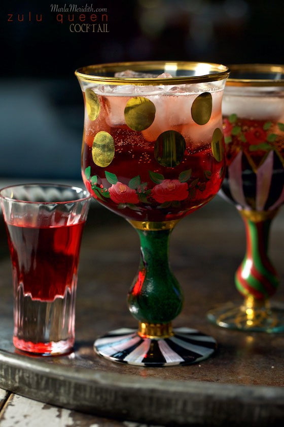 Zulu Queen Cocktail A sparkling drink with Campari, Chambord, St